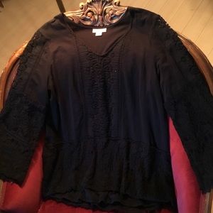 Lace trimmed black knit top